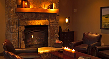 Relax by the fireplace with a good book.